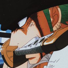 an anime character holding a knife in his right hand