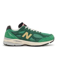 Step into luxury and style with the iconic New Balance Made in U.S.A. 990V3 Sneakers - 40th Anniversary edition. Crafted with a premium suede leather and mesh upper, these sneakers boast the classic side N monogram in reflex fabric and contrasting suede leather inserts for a sleek and sophisticated look. Complete with a logo detail on the tongue and a rubber insert with an embossed logo on the heel base, these sneakers are the epitome of designer footwear. Featuring a fabric lining with a remova Gold New Balance, New Balance 990v3, Teddy Santis, Green New Balance, Balance Branding, New Balance 990, Dad Sneakers, Heritage Fashion, Sneaker Games