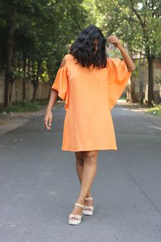 "Shift dress for women, Orange linen dress, Linen frill dress, Linen shift tunic, Made to order, Custom made, Plus size -Model height: 5'3\" wearing size S -Length: 34\" Paisley motif in front with a little sequins work. This kind of embroidery is called maggam. **Note: Free Shipping time 15-21 days. Express Shipping time 5-7 days.**" Orange Shift Dress For Summer, Summer Orange Shift Dress, Flowy Linen Dress For Day Out, Linen Ruffle Dress For Day Out, Spring Linen Dress With Ruffle Sleeves, Linen Mini Length Dress For Brunch, Linen Tunic Dress For Day Out, Beach Dress With Ruffle Sleeves In Cotton, Beach Midi Dress With Ruffle Sleeves