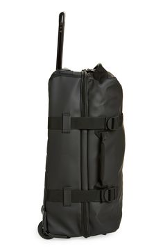 This durable piece of luggage for work or adventures is constructed from Rains’s signature waterproof fabric to keep your travel essentials dry.Closure: Two-way, zip-around closure.Exterior features: A telescopic handle, side-mounted adjustable straps, front zip pocket, top-carry and side-carry handles.Interior features: Two main compartments and compression straps keep your items neatly organized. Waterproof Textile with polyurethane coating Imported Sporty Luggage With Zipper Closure For Trips, Sporty Nylon Luggage With Luggage Sleeve, Nylon Luggage With Zipper Closure For On-the-go, Waterproof Functional Travel Bag For Overnight Trips, Black Waterproof Functional Luggage, Waterproof Functional Luggage For Outdoor Activities, Black Travel Bag With Ykk Zipper, Functional Waterproof Travel Bag For Overnight Trips, Functional Travel Bag With Ykk Zipper