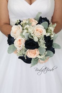 a bride holding a bouquet of flowers in her hands