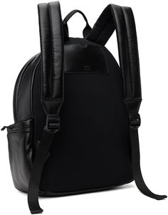 Nappa sheepskin backpack in black. · Rolled webbing carry handle · Adjustable padded shoulder straps · Logo hardware at face · Press-release straps and zip pocket at face · Patch pocket at sides · Logo-embossed patch pocket at back face · Two-way zip closure · Padded mesh laptop compartment at interior · Twill lining · Logo-engraved hardware · H15.5 x W12.5 x D6.5 Supplier color: Black Modern Black Backpack With Leather Trim, Black Travel Bag With Removable Padding, Black Backpack With Leather Trim For Everyday Use, Black Bag With Leather Trim For Commuting, Everyday Black Backpack With Leather Trim, Black Leather Backpack With Leather Trim For Travel, Modern Black Leather Backpack With Leather Trim, Black Leather Trim Backpack For Everyday Use, Modern Black Leather Backpack With Trim