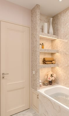 a bath room with a tub and a shelf