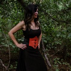 "These corsets are the perfect costume accessory for any Renaissance, Medieval, Fairy, Elvish, and many more cosplay outfits. These corsets are great quality with embroidered edges, metal eyelets, and leather ties. They have a very comfortable fit made from vinyl leather and the elastic straps will contour to your body and snap in the back. FAUX LEATHER COLOR OPTIONS: 14 Colors available ELASTIC COLOR: Elastic will be BLACK for all corset belts. SIZE OPTIONS: Recommended for Kids & Youth X-Small Black Steampunk Corset For Halloween, Steampunk Black Corset For Halloween, Steampunk Corset Dress For Cosplay, Black Steampunk Corset For Costume Party, Black Steampunk Costume Accessories For Fantasy Events, Witchy Corset Dress For Cosplay, Gothic Cosplay Costume, Black Steampunk Corset For Larp, Steampunk Black Corset For Festivals