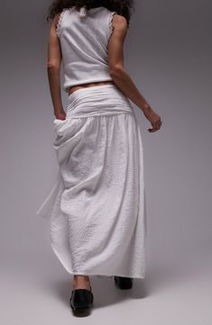 Add some boho charm to your look with this lightweight, cotton-rich maxi skirt featuring ruching at the waist that leads to a flowy silhouette. 36 1/2" center front length (size 8) Hidden side-zip closure Unlined 48% viscose, 31% cotton, 21% nylon Machine wash, line dry Imported Spring Cotton Maxi Dress With Elastic Waistband, Summer Maxi Skirt With Gathered Waist, Relaxed Maxi Skirt With Gathered Waist, Beach Maxi Dress With Elastic Waistband And Relaxed Skirt, Casual Cotton Maxi Dress With Gathered Waist, Summer Long Skirt With Gathered Waist, Casual Flowy Maxi Skirt With Gathered Waist, Casual Maxi Skirt With Gathered Waist, Casual Summer Maxi Skirt With Gathered Waist