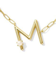 Let your personality pop when you wear the Pearl Gold Letter M Short Pendant Necklace in Freshwater Cultured Pearl. This oversized, angled letter pendant will really put you front and center (because where else would you be?). Topped with a freshwater cultured pearl for that extra wow factor, there’s no way people won’t be asking about this must-have layerable. Metal 14k Yellow Gold Over Brass Material Freshwater Cultured Pearl Closure Lobster Clasp Size 19" Chain, 0.75"L X 0.74"W Pendant Materi Short Pendant Necklace, Pearl Letters, Buy Pearls, Gold Letter, Initial Necklace Gold, Letter M, Jewelry Unique, Letter Pendants, Gold Letters