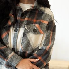 Get ready for your new favorite go-to plaid shacket! It will keep you cozy and warm as our weather starts to to cool. Model is 5'8" and is wearing a size Small Fabric: 60% Polyester, 40% Recycled Polyester Cozy Everyday Shacket For Fall, Cozy Everyday Fall Shacket, Casual Fall Shacket For Cold Weather, Plaid Button-up Shacket For Fall, Fall Plaid Flannel Shirt With Pockets, Plaid Flannel Outerwear With Long Sleeves, Plaid Flannel Shirt For Fall With Button Closure, Winter Plaid Collared Shacket, Cozy Plaid Winter Outerwear