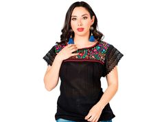 Blusa tradicional bordada Hecho en Mexico por nuestros artesanos No Incluye Accesorios Color de bordado puede varear en tonos y diseno Classic Mexican Design Blouse Made in Mexico by our Artesanos Does not include Accessories Embroidery/Thread color may vary No two tops are the same Black Tops With Resham Embroidery For Festivals, Traditional Multicolor Embroidered Top With Sleeves, Black Tops With Floral Embroidery For Festivals, Black Floral Embroidered Tops For Festivals, Traditional Black Tops With Intricate Embroidery, Traditional Black Embroidered Top, Traditional Black Tops With Embroidered Border, Traditional Black Top With Embroidered Border, Black Traditional Embroidered Top With Geometric Design