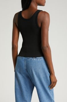 Perfect to layer or wear solo, this essential ribbed tank top is cut from a stretchy organic-cotton blend in a cropped silhouette. 20" length (size Medium) Scoop neck 95% organic cotton, 5% elastane Machine wash, line dry Imported Basic Cropped Ribbed Tank Top, Everyday Fitted Ribbed Tank Top, Fitted Ribbed Tank Top For Layering, Fitted Tank Top With Ribbed Neckline For Layering, Ribbed Spring Tank Top With Minimal Stretch, Ribbed Tank Top With Minimal Stretch For Spring, Casual Ribbed Tank Top With Minimal Stretch, Fitted Ribbed Tank Top For Everyday, Casual Ribbed Tank Top