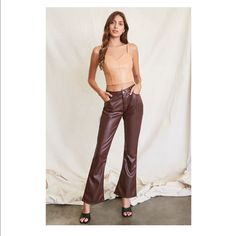 Nwt Forever21 Faux Leather Flare Pants A Pair Of Faux Leather Pants Featuring A Flare Leg, Belt Loops, A Five-Pocket Construction, And Mid Rise. -100% Polyester Trendy Brown Bottoms For Date Night, Forever 21 Wide Leg Pants For Fall, Trendy Brown Leather Pants For Party, Forever 21 Fall Trousers, Forever 21 High-waist Fall Pants, Forever 21 High Waist Fall Pants, Forever 21 High Waist Pants For Fall, Trendy Forever 21 Pants For Fall, Forever 21 Trousers For Fall