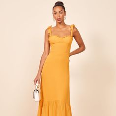 Nikita Dress Perfect Classic And Flattering Midi Dress In A Color Sold Out Online! The Ochre Nikita Is A Golden Yellow, Gold, Or Mustard Yellow Color Pricing Is Somewhat Firm As I Would Keep It If I Had An Event To Wear It To! $278 Ankle Alert. The Nikita Is Fitted In The Bodice And Waist With A Relaxed Fitting Skirt. This Midi Length Dress Has A Ruffle Edged Neckline, Adjustable Strap Ties, And A Trumpet Skirt. It Gives You A Pretty Good Balance Of Comfort And Shape. - Center Back Zipper - Line Fitted Yellow Midi Dress With Ruffles, Yellow Fitted Midi Dress With Ruffles, Yellow Sleeveless Dresses For Brunch, Chic Sleeveless Mustard Maxi Dress, Chic Fitted Mustard Maxi Dress, Elegant Fitted Mustard Midi Dress, Sleeveless Mustard Dresses For Brunch, Sleeveless Mustard Dress For Brunch, Mustard Sleeveless Dress For Brunch