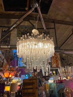 a chandelier hanging from the ceiling in a store