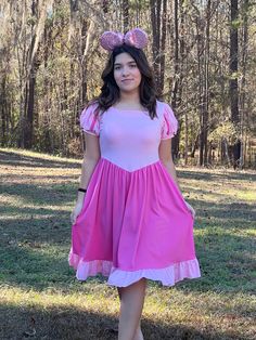 Our Sleeping Beauty dress features two shades of pink in a romantic and delicate pattern. It makes a perfect Disneybound piece, just add your favorite princess Aurora accessories and you will look amazing at the parks! Ruffled bottom. Ballgown puffy sleeves. It has pockets. Soft 95% cotton and 5% spandex. Fitted Princesscore Dress For Costume Party, Pink Feminine Dress For Costume Party, Feminine Pink Dress For Costume Party, Pink Short Sleeve Dress For Costume Party, Fitted Princesscore Dresses, Spring Fairytale Costume Party Dresses, Spring Fairytale Dresses For Costume Party, Fairytale Style Fitted Dress For Dress-up Occasions, Fitted Fairytale Dress For Dress-up Occasions