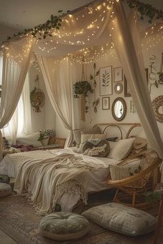 a bedroom with white curtains and lights on the ceiling