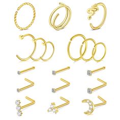 various types of rings and piercings on a white background