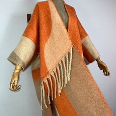 This super soft and warm wool cardigan kimono is perfect for the cold weather. Unlike other sweaters and wools, the wool used for this beauty is non itchy. Think of your favorite throw blanket, the comfort and warmth it gives but 10x stylish and wearable any where. This kimono is all that and more! One size fits S-4X Material: Wool One Size Fits Most Size Chart Fall Cashmere Outerwear With Shawl Collar, Winter Layering Sweater Coat With Soft Texture, Cozy Sweater Coat With Soft Texture For Fall, Soft Wool Sweater For Winter, Winter Wool Sweater With Soft Texture, Oversized Fall Sweater Coat With Soft Texture, Cozy Soft-textured Sweater Coat For Fall, Cozy Wool Outerwear For Layering, Oversized Soft Sweater Coat For Fall