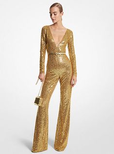 Own the room in this eye-catching jumpsuit. Defined by a dazzling display of suntan-and-gold sequin embroidery, it’s crafted from stretch tulle and cut in a figure-hugging silhouette with a plunging neckline. Play up the glamour factor with complementing accessories. Gold Party Jumpsuit With Sequins, Gold Sequined Jumpsuits And Rompers For Party, Glamorous Gold Jumpsuits And Rompers For Party Season, Embellished Jumpsuits And Rompers For Evening Party Season, Elegant Gold Jumpsuits And Rompers For Party, Glamorous Floor-length Sequin Jumpsuit, Glamorous Fitted Gold Jumpsuits And Rompers, Glamorous Floor-length Sequin Jumpsuit Or Romper, Glamorous Embellished Evening Jumpsuits And Rompers