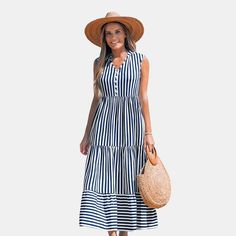 Make a statement in our Striped Tiered Ruffled Maxi Dress. With its tiered ruffle design, it's the perfect blend of fun and sophisticated for any summer occasion. Whether you're attending a glamorous event or simply enjoying a casual day out, this dress will keep you feeling confident, stylish, and perfectly in tune with the vibrant energy of the season. Product code: CAA05A4E204TC Tiered Dress For Beach Season Day Out, Casual Tiered Dress For Beach, Tiered Dresses For Beach Season, Tiered Summer Dress For Vacation, Tiered Summer Vacation Dresses, Summer Picnic Maxi Dress With Ruffles, Summer Beach Tiered Ruffle Dress, Summer Maxi Dress With Ruffles For Picnic, Casual Tiered Ruffle Dress For Beach