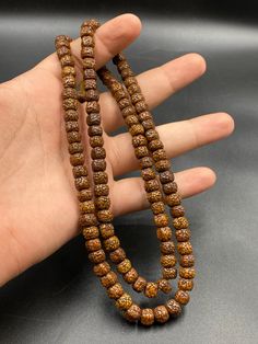 Old Rudraksha Buddhist Mala Beads Meditation Mala Necklace Healing Wooden Beads Jewelry For Festivals, Spiritual Polished Brown Beads, Spiritual Brown Polished Beads, Brown Wooden Beads Jewelry For Puja, Spiritual Hand-strung Amber Beaded Necklaces, 8mm Amber Beads For Spiritual Use, Holistic Beaded Necklaces For Rituals, 8mm Amber Spiritual Beads, Holistic Necklaces With 8mm Beads For Festivals