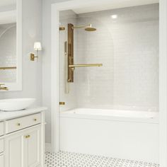 a bathroom with two sinks and a bathtub in the middle, along with a large mirror on the wall