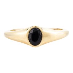 This is part of Chairish’s Fine Jewelry assortment.  Unisex Black Onyx Promise Ring in 14K Gold featuring natural onyx of 0.3 carats. The gorgeous handcrafted ring goes with every style, every occasion or any outfit.  Onyx gives energy of strong support and determination to hep one persevere.  Designed with round cut black onyx studded in center with solid gold that makes it a perfect fit to wear it on your occasion or style it with any of your basic outfit to give it a glam. This is a perfect e Minimalist Onyx Ring For Formal Occasions, Minimalist Onyx Rings For Formal Occasions, Classic Oval Black Spinel Jewelry, Timeless Onyx Gemstone Rings, Elegant Onyx Signet Ring With Gemstone, Formal Yellow Gold Rings With Black Spinel, Elegant Yellow Gold Rings With Black Spinel, Elegant Yellow Gold Ring With Black Spinel, Elegant Oval Black Spinel Rings