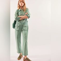 Introducing The Free People We The Free Geronimo Jumpsuit Coverall In Cascada Green, Size Small. This One-Piece Jumpsuit Coverall Features A Button-Up Collar And Front Button Closures With Cuffs, A Classic Collar, And Oversized Workwear Pockets. The Relaxed Fit And Straight Leg Style Make It Perfect For Any Occasion, From Casual To Party/Cocktail, Workwear, Or Even Travel. Made From 100% Cotton Denim With A Rigid Seam Pattern, This Jumpsuit Coverall Is Machine Washable And Easy To Care For. It H Spring Utility Denim Jumpsuit With Side Pockets, Spring Denim Jumpsuit With Patch Pockets For Work, Spring Workwear Denim Jumpsuit With Patch Pockets, Spring Utility Jumpsuits And Rompers With Pockets, Utility Denim Jumpsuit With Patch Pockets For Work, Spring Long Sleeve Jumpsuits And Rompers With Side Pockets, Denim Jumpsuit With Side Pockets For Work, Green Utility Jumpsuits And Rompers For Spring, Green Workwear Overalls