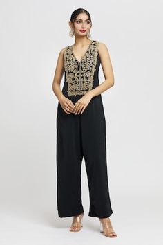 Black jumpsuit with contrast floral and sequin embroidered bodice. - Aza Fashions Fitted Embroidered Jumpsuit For Festive Occasions, Embroidered Fitted Jumpsuits And Rompers For Festive Occasions, Festive Embroidered Fitted Jumpsuits And Rompers, Elegant Sleeveless Jumpsuits And Rompers For Festive Occasions, Elegant Embellished Festive Jumpsuits And Rompers, Elegant Embellished Jumpsuits And Rompers For Festive Occasions, Elegant Embroidered Jumpsuits And Rompers For Party, Festive Jumpsuits And Rompers For Night Out, Gopi Vaid