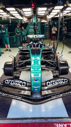 the new mercedes w02 is on display in the garage at silverstone circuit