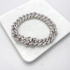 Silver Filled 10mm Iced Miami Cuban Chain Featuring Double Safety Lock Box Cubic Zirconia, Chain or Bracelet, Wholesale Jewelry.- Chain Size:Thickness: 10mm | Clasp Size: 15mmLength: 16 and 18 inches - Bracelet Size:Thickness: 10mm | Clasp Size: 15mmLength: 7 and 8.5 inches Bracelets Silver, Jewelry Chain, Miami Cuban, Cuban Link Chain, Cuban Chain, Cuban Link, Bracelet Sizes, Wholesale Jewelry, Chains Jewelry