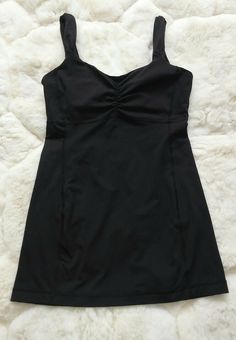 Lululemon Athletic Tank Top w/ Shelf Bra Size: 6 Color: Black Pad Pockets (no pads included) Lightly worn. Great condition. Please see photos for measurements. FS0251 Black Tank Top Outfit, Black Tank Tops Outfit, Vintage Lululemon, Bra Tank Top, Desired Reality, Tank Top Outfits, Gym Shirt, Style Box, Lululemon Tops