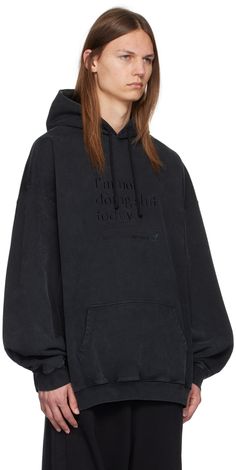 French terry hoodie. · Drawstring and embroidered logo at hood · Text embroidered at front · Kangaroo pocket · Rib knit hem and cuffs · Dropped shoulders · Graphic and text at back Supplier color: Blackout Relaxed Fit Hoodie With Embroidered Logo For Streetwear, Oversized Hooded Sweatshirt With Embroidered Logo, Winter Hoodie With Embroidered Logo And Relaxed Fit, Black Hoodie With Embroidered Logo For Winter, Oversized Hooded Hoodie With Embroidered Logo, Oversized Hoodie With Embroidered Logo For Winter, Oversized Winter Hoodie With Embroidered Logo, Winter Cotton Hoodie With Embroidered Logo, French Terry Hoodie