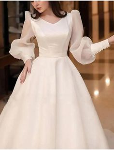 Hall Formal Wedding Dresses A-Line V Neck Long Sleeve Chapel Train Satin Bridal Gowns With Solid Color Fitted Bodice V-neck Bridesmaid Dress For Wedding, Elegant V-neck Bridal Dress, Cream Ball Gown Wedding Dress, White V-neck Dress For Debutante Ball, V-neck Wedding Gown With Sweep Train, Elegant Ball Gown With Sweep Train For Wedding Night, V-neck Bridesmaid Dress With Sweep Train For Wedding, Elegant Long Sleeve Bridesmaid Dress, Off White Floor-length Dresses For Wedding