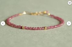 Pink Tourmaline Bracelet, small pink gemstones, gold beads, slim, elegant, stacking, quality real pink tourmaline jewelry, Christmas Gift This bracelet is very dainty - beads measure about 2.5 mm apiece AAA Quality Please Feel Free To Contact If You Have Any Query. Orders are shipped within 1 business working day, excluding orders made on Sunday or national holidays. Domestic delivery takes 5-7 business days. International delivery takes 11-23 business days. PAYMENT METHOD : PayPal only Please s Elegant Tourmaline Gemstone Bead Bracelets, Elegant Tourmaline Gemstone Beads Bracelet, Elegant Pink Beaded Bracelets With Tiny Beads, Elegant Pink Beaded Bracelet With Tiny Beads, Elegant Pink Tourmaline Bracelets, Pink Tourmaline Jewelry, Tourmaline Bracelet, Tourmaline Jewelry, Jewelry Christmas