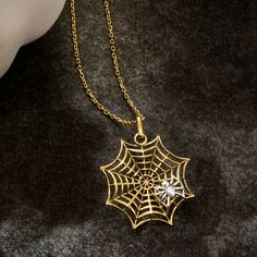 Ross-Simons - 14kt Two-Tone Gold Spiderweb Pendant Necklace. 18". If spooky season is your favorite, you'll love this unique pendant necklace. A stylish spiderweb shines in polished 14kt yellow gold with a tiny 14kt white gold spider perched on top. Suspends from a classic cable chain with a 2" extender. Springring clasp, 14kt two-tone gold spiderweb pendant necklace. Unique Pendant Necklace, Unique Pendant, Spider Web, Spooky Season, Cable Chain, Two Tone, Cable, Yellow Gold, White Gold