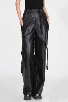 These trousers feature wide legs, pocket flaps, an elastic waistband and adjustable belt, and pockets for convenience.Fabric: Polyester Trousers For Women, Leather Trousers, Faux Leather Pants, Wide Legs, Female Fashion, Sweater Set, Adjustable Belt, Printed Maxi Dress, Fashion Pants