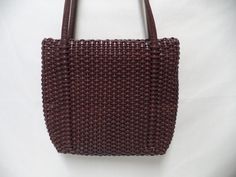 Mint condition; clean. Leather; zip compartment, 2 slide compartments, zip pocket.. Measures 8.5" wide, 8" tall, depth is 2", strap drop is 14". Thank You. Formal Brown Woven Bag, Formal Brown Woven Bags, Vintage Basket, Vintage Baskets, Brown Shoulder Bag, Leather Weaving, Basket Weave, Zip Top, Basket Weaving