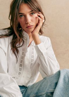 Long-sleeved shirt ;High collar ;Gathered ruffle around collar and placket ;Embroidered openwork lace band on the body;Mother-of-pearl buttons ;Length from shoulder 62.5 cm / 24.6 in (for a 36) Broderie Anglaise Tops For Work, Fall Workwear Top With Broderie Anglaise, Elegant Broderie Anglaise Blouse For Fall, Elegant Long Sleeve Shirt With Broderie Anglaise, Elegant Shirt With Lace Collar For Spring, Collared Top With Lace Cuffs, Feminine Blouse With Broderie Anglaise, Fall Daywear Tops With Lace Cuffs, Fall Lace Cuff Tops For Daywear