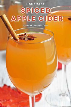 the homemade spiced apple cider is garnished with cinnamon and anise