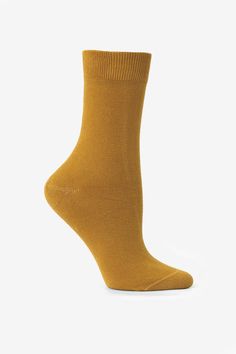 A classic lightweight sock with a traditional mid-calf rise that hits a few inches above the ankle. These socks feature a flat knit body with a ribbed top to keep them up throughout the day. Please note: select colors of this sock are garment dyed and enzyme washed which can result in subtle irregularities, softer fibers and a slightly more textured hand. • Unisex• Made in Los Angeles, Calif.• Crew Sock• 100% Shrink Free Garment dye Cotton | Summer Sock in Amber, Size 6~9 Summer Sock, Swim Shoes, Crew Sock, Ribbed Top, Sweaters And Leggings, Fashion Socks, Summer Cotton, Ankle Socks, Blue Moon