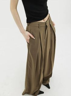 Infuse elegance into your wardrobe with our Wide Leg Criss-Cross Pleated Palazzo Trousers, a harmonious blend of comfort and chic.
Crafted with attention to detail, these trousers feature a high-waist cut for a flattering silhouette and come in a timeless black shade. Asymmetrical pleats add a touch of uniqueness, while the fluid fabric encapsulates a modern, commute-friendly vibe. They're perfect for both a professional setting and casual outings.
Pair them with a fitted blouse for work or a re Blouse For Work, Fitted Blouse, Palazzo Trousers, Boys Backpacks, Black Shade, Work Blouse, Shades Of Black, Criss Cross, Wide Leg Pants