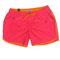 Women’s Shorts ( I Think They Are Swim Shorts But I’m Not Certain By Feeling The Material In My Opinion They Could Be Used As Swim Shorts Or Athletic Shorts ) *New With Tags* Color: Pink And Orange Brand: Us Apparrel Size: Small (S) Pics Are To Help You Determine The Condition Bundle 3 Or More Items For A Discount! Pink Swim Trunks With Built-in Shorts For Beach Season, Pink Stretch Swim Trunks For Summer, Pink Stretch Swim Trunks For Beach Season, Pink Swim Trunks With Built-in Shorts For Spring, Pink Short Swim Trunks For Summer, Pink Swim Trunks With Built-in Shorts, Pink Swim Trunks With Elastic Waistband For Summer, Pink Stretch Swim Trunks For Spring, Pink Beachwear Swim Trunks With Built-in Shorts