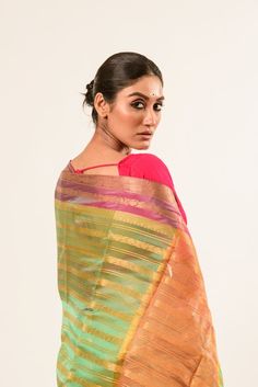 Discover the elegance of our Designer Green Organza Silk Saree featuring a vibrant pink border and luxurious gold strip. Perfect for any occasion. Pink Tissue Silk Saree For Celebration, Elegant Multicolor Traditional Wear For Festive Season, Elegant Multicolor Traditional Wear For Celebration, Elegant Multicolor Zari Work Traditional Wear, Designer Multicolor Festive Dupatta, Pink Art Silk Traditional Wear With Border, Elegant Pink Traditional Wear With Pallu, Designer Multicolor Zari Work Dupatta, Elegant Multicolor Banarasi Silk Blouse Piece