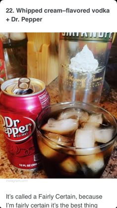 a can of dr pepper and some ice cubes on a counter with a drink