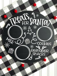 a black and white checkered table cloth with a christmas ornament on it