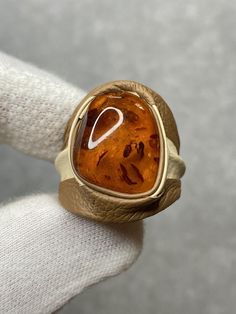 Natural Baltic Amber Adjustable Ring Cognac Color With Leather Luxury Brown Formal Rings, Modern Brown Rings For Anniversary, Elegant Brown Leather Jewelry, Modern Brown Anniversary Ring, Formal Handmade Leather Jewelry, Modern Brown Rings For Gift, Modern Brown Rings For Gifts, Unique Brown Rings For Formal Occasions, Adjustable Oval Brown Rings