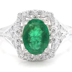 1.50 Carats Natural Emerald And Diamond 14k Solid Yellow Gold Ring Suggested Replacement Value: $4,500.00 Total Natural Green Emerald Weight Is: Approx. 1.50 Carats (Transparent) Emerald Measures: Approx. 9.00 X 7.00mm Natural Round Diamonds Weight: 0.20 Carats (Color G-H / Clarity Si1-Si2) Ring Size: 6 (Free Re-Sizing Available) Ring Total Weight: Approx. 4.1 Grams Sku #595 Dazzling Round Emerald Jewelry, Dazzling Round Emerald Ring In Sterling Silver, Luxury Emerald Crystal Round Ring, Classic Emerald Green Crystal Ring, Luxury Dazzling Green Emerald Ring, Green Emerald, Yellow Gold Ring, Natural Emerald, Emerald Diamond