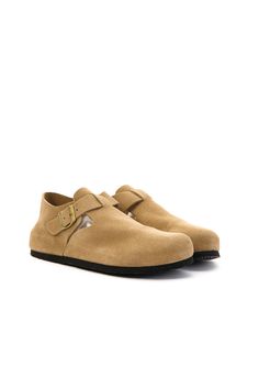 Experience unbeatable comfort with the MAIBULUN Seashore Suede Clog Loafer. Made with soft suede material, these loafers are perfect for all-day wear, providing both style and support. Slip into these tan loafers and take on your day with ease. 0.78" Heel Slip-on / buckle closure Hard Cushioned footbed Suede 100% leather upper Leather lining EVA sole Suede Slip-ons With Rubber Sole, Everyday Flat Heel Clogs With Rubber Sole, Suede Flats With Leather Footbed, Everyday Suede Slip-ons With Cushioned Footbed, Casual Beige Clogs With Leather Sole, Beige Suede Clogs With Round Toe, Suede Slip-ons With Cushioned Footbed, Suede Slip-ons With Cushioned Footbed And Plain Toe, Suede Clogs With Textured Footbed And Flat Heel