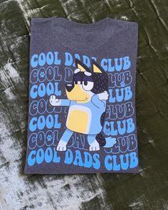 Shortlseeve heather blue "Cool Dads Club" Bluey Tee Cool Blue Crew Neck Tops, Stencil Material, Dad To Be Shirts, Favorite Outfit, Gender Neutral, Graphic Tees, Beauty Book, Pet Supplies, Adult Outfits