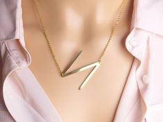 "-length: 19\" +2\" adjustable extension inch (as shown on the picture) -pendant size: 25mm x 35mm approx. -material: gold plated. -lobster clasp -available..Gold -comes with gift box *see other letters necklace here: https://www.etsy.com/listing/584516500/large-initial-necklace-oversized-big?ref=shop_home_active_5" N Alphabet, N Necklace, Handcuff Necklace, Letters Necklace, Lunar Jewelry, Crescent Moon Necklace Gold, Gold Initial Necklace, Jewelry Gift Ideas, Autumn Necklace