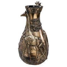 a bronze vase with a giraffe on it